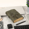 dark green deckle edge paper leather journal with vintage key