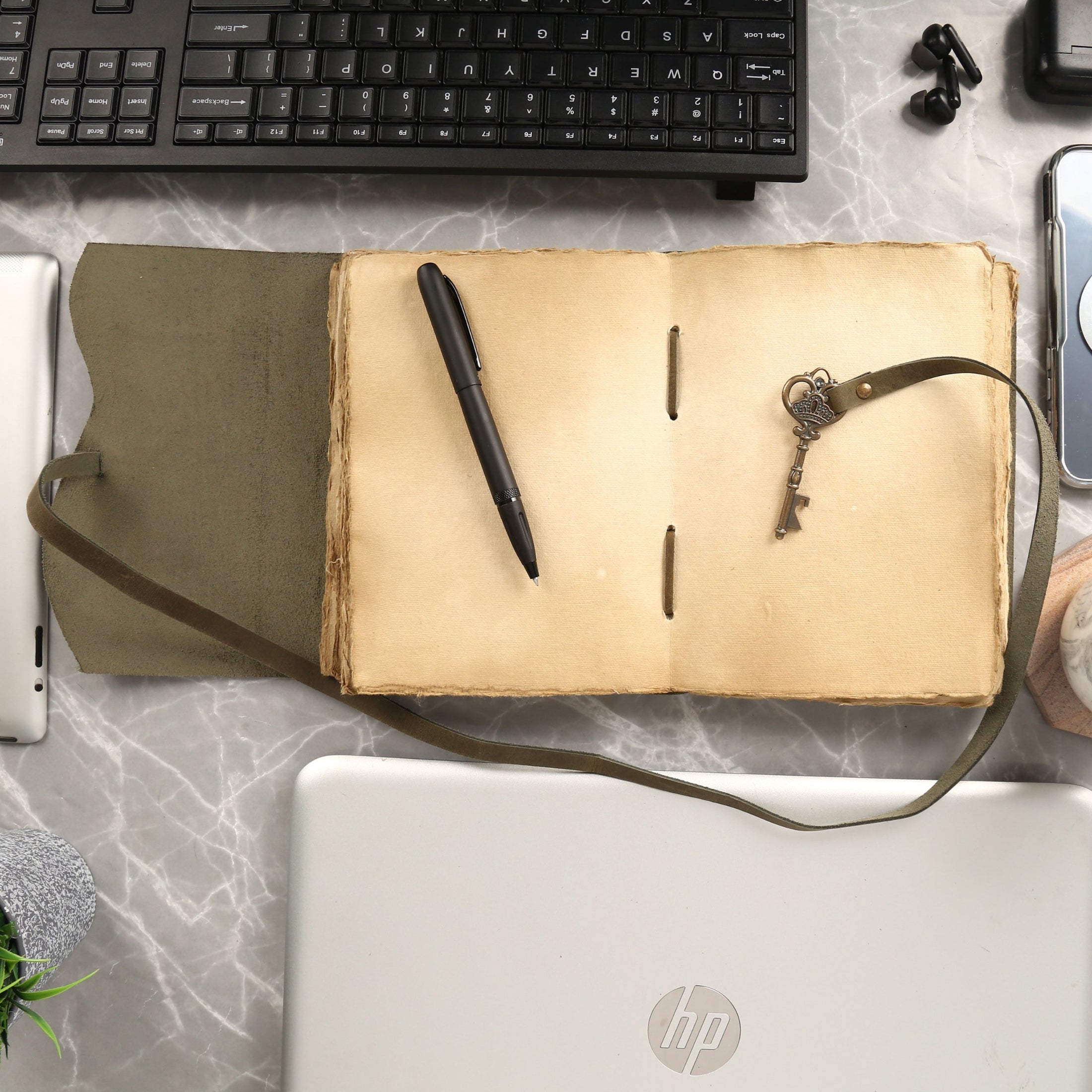 unlined leather journal with vintage key
