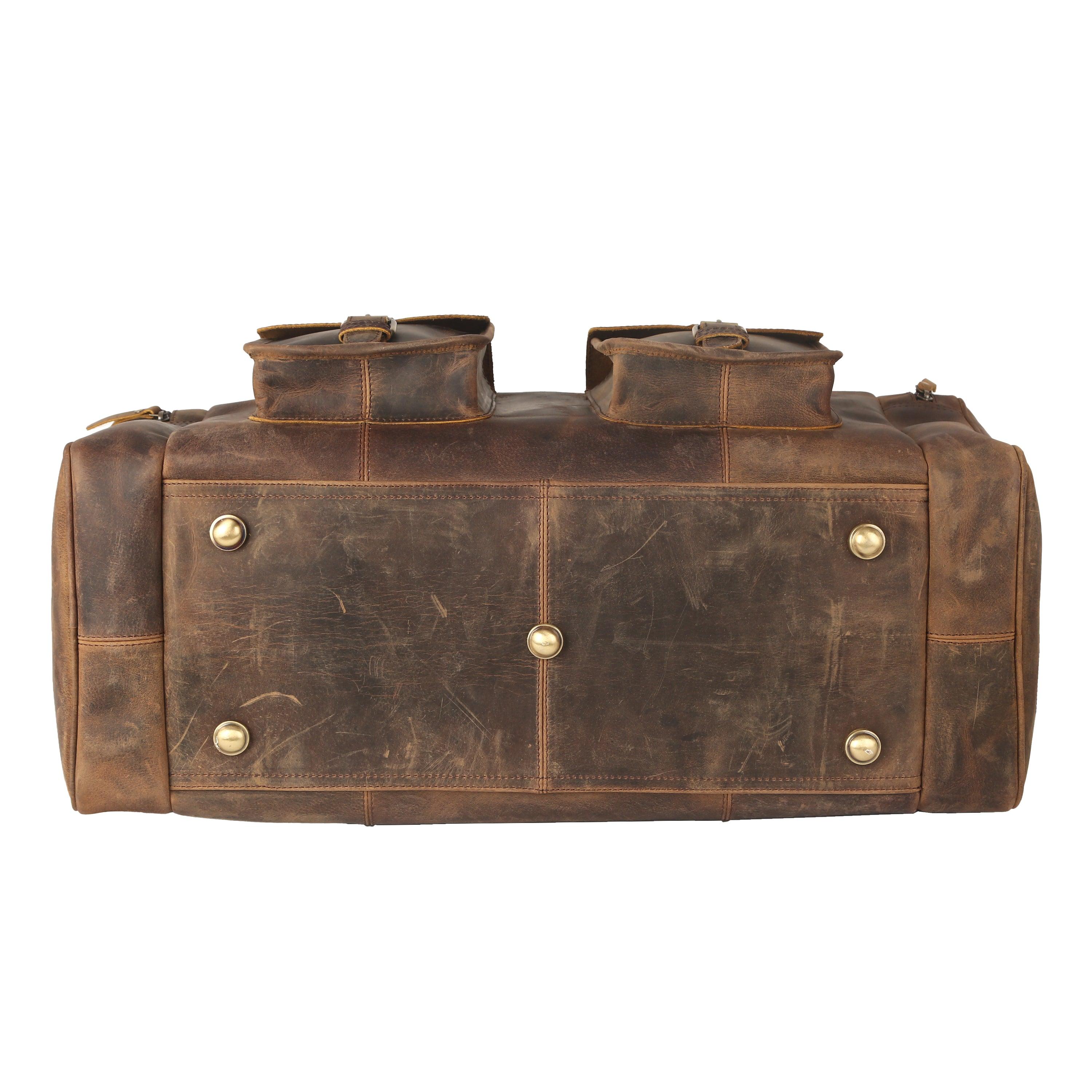 leather duffle bag base has metal studs