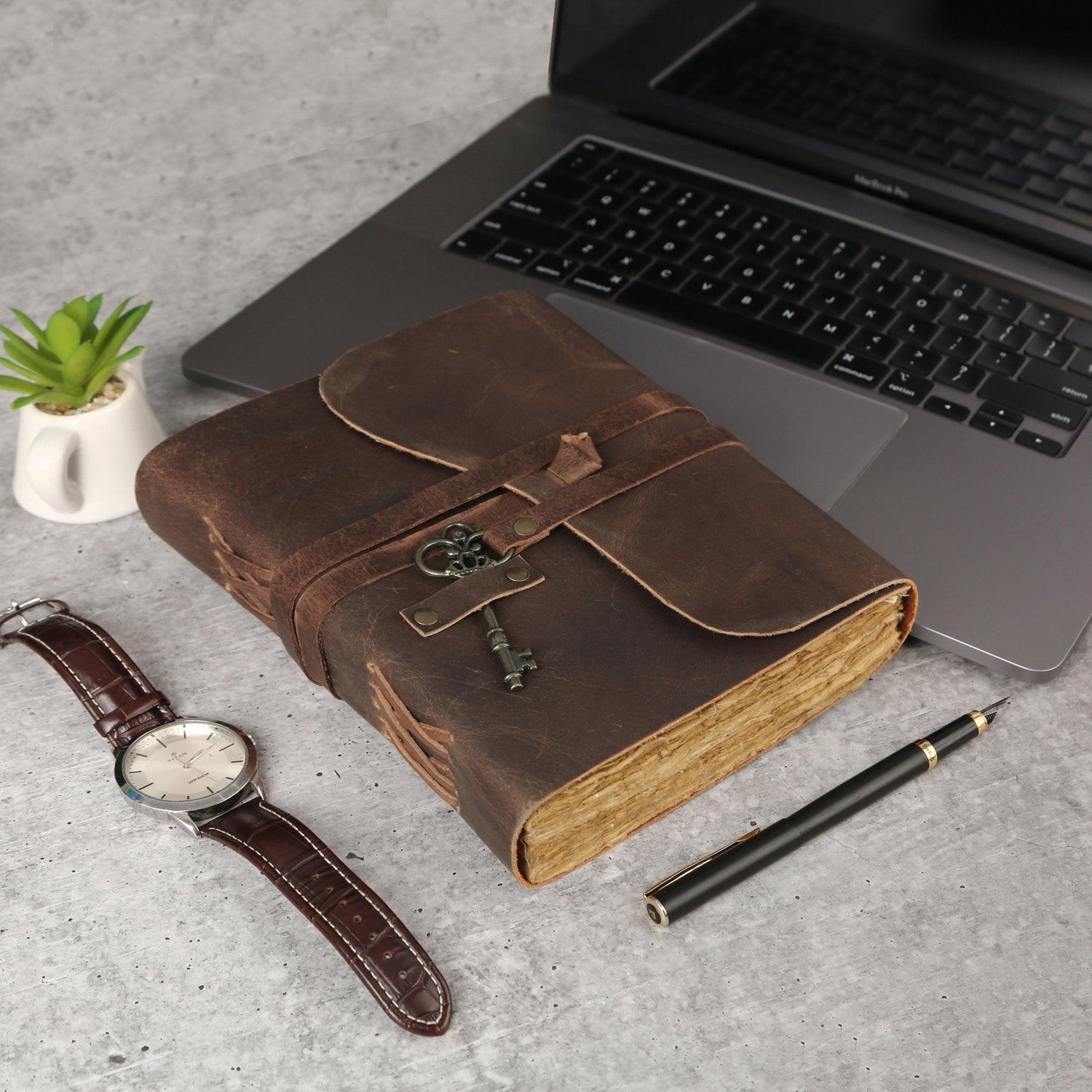 Handmade rustic leather journal with key clasp, 8x6 inches, ideal for sketching and writing