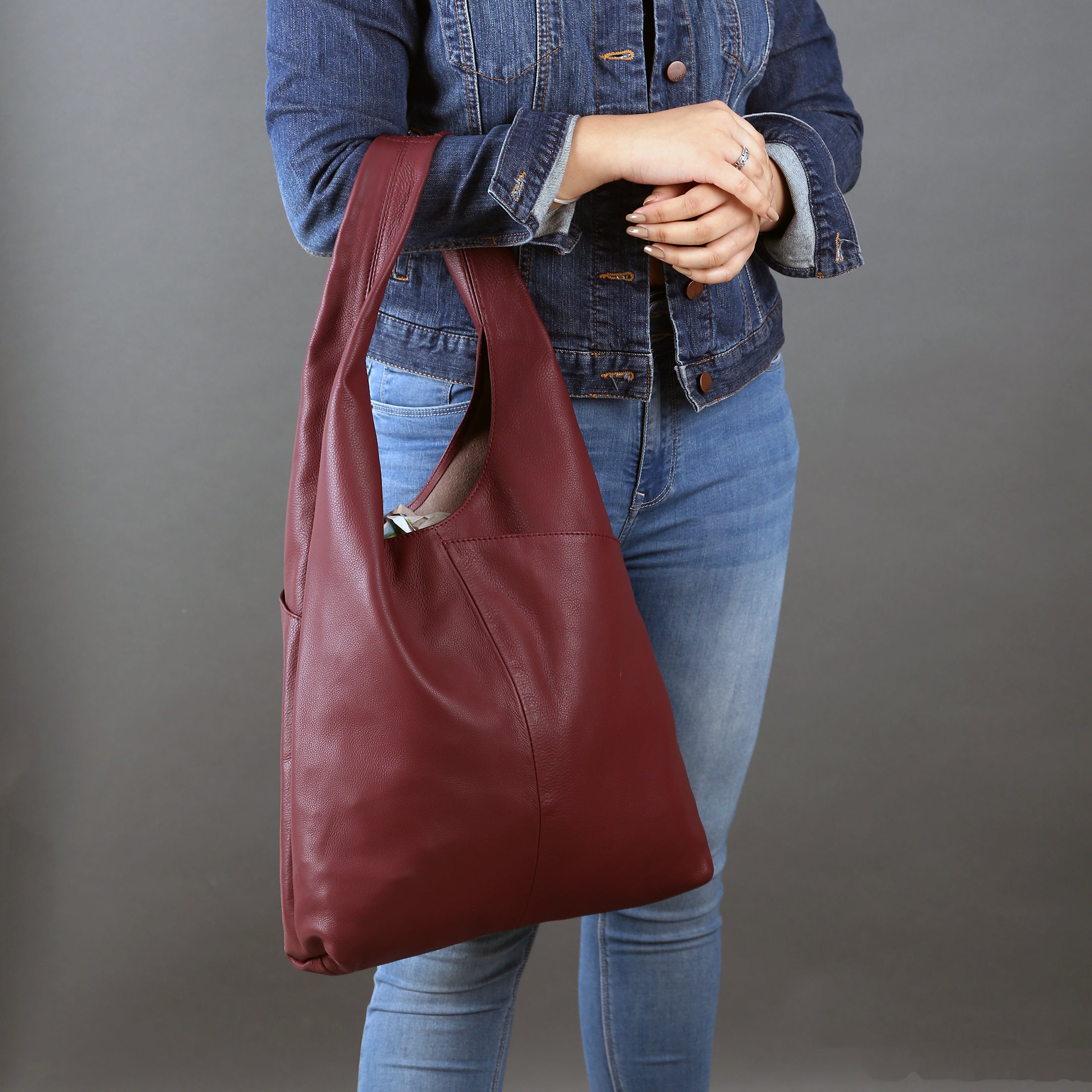 leather tote bag in burgundy color