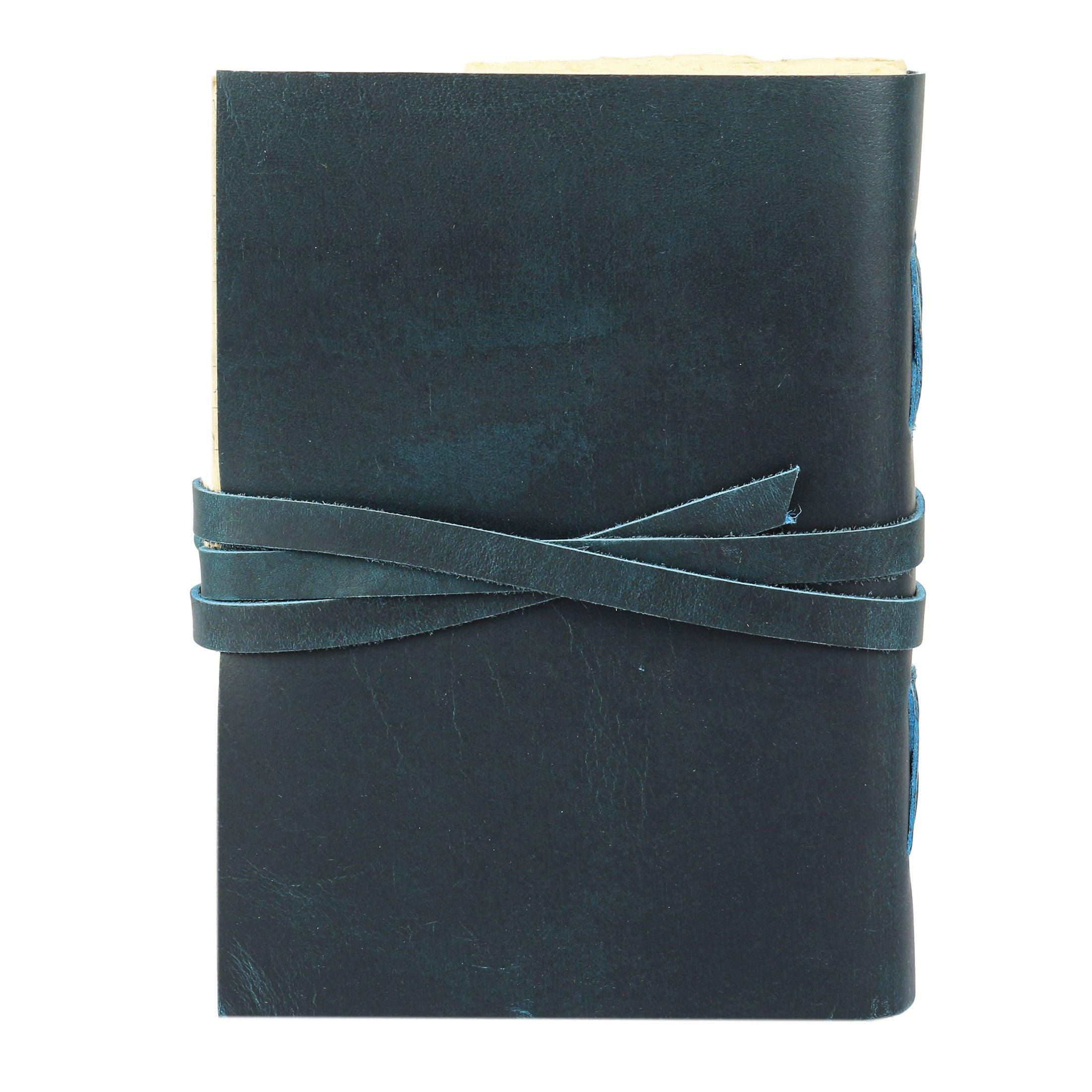 leather wraparound strap with lined deckle edge paper of leather journal