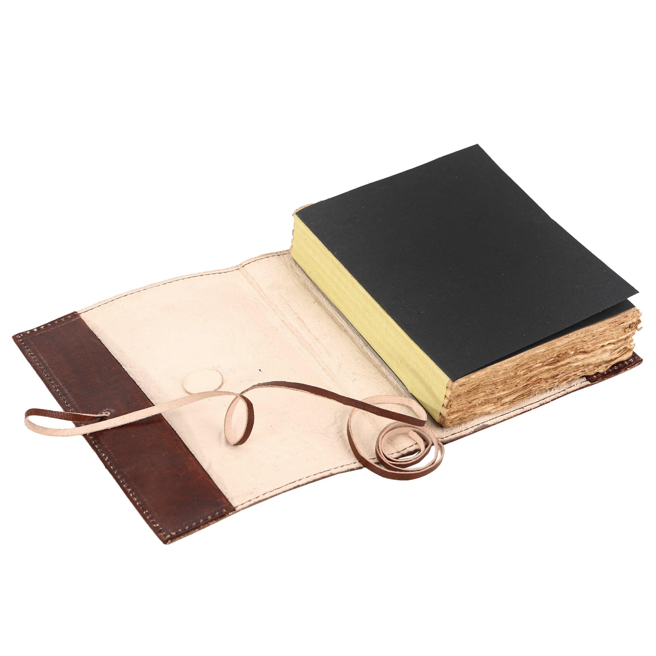 Refillable leather journal with lined deckle paper